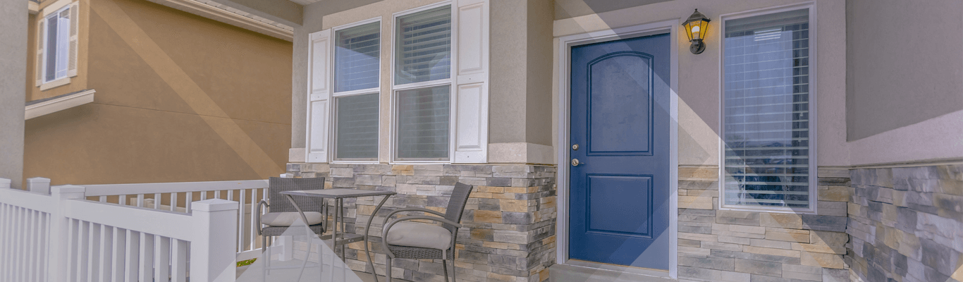 Illustrative home exterior showing windows and an entry door